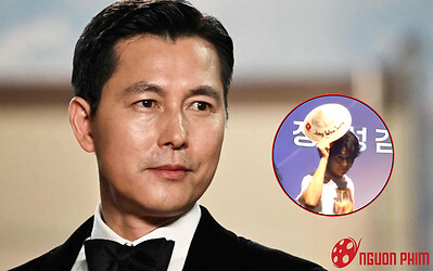 Jung Woo Sung đội nón lá, cúi chào fan Việt khi đi quảng bá phim